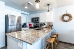 Updated kitchen with granite and stainless steel appliances